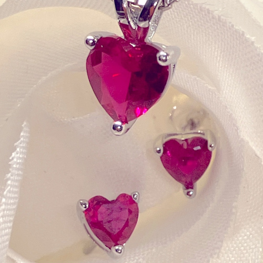 Sold
Sterling silver Triple A ruby CZ earrings and necklace